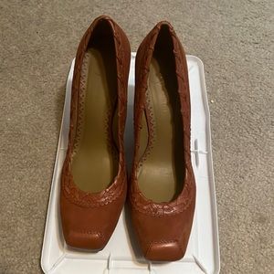 Slightly worn Vince Camuto brown wedge heels.